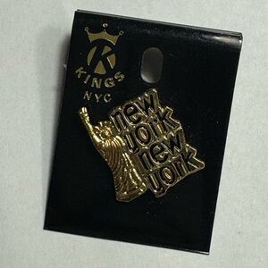 Gold New York Brooch